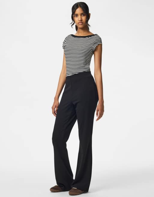 Pieces leggings acampanados en negro, 3 de 7
