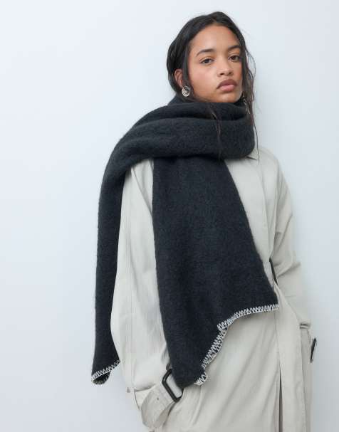 Pieces long knitted scarf with blanket stitch trim in black - view 1
