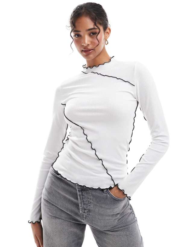 Pieces - long sleeved top with contrast lettuce edge detailing in white