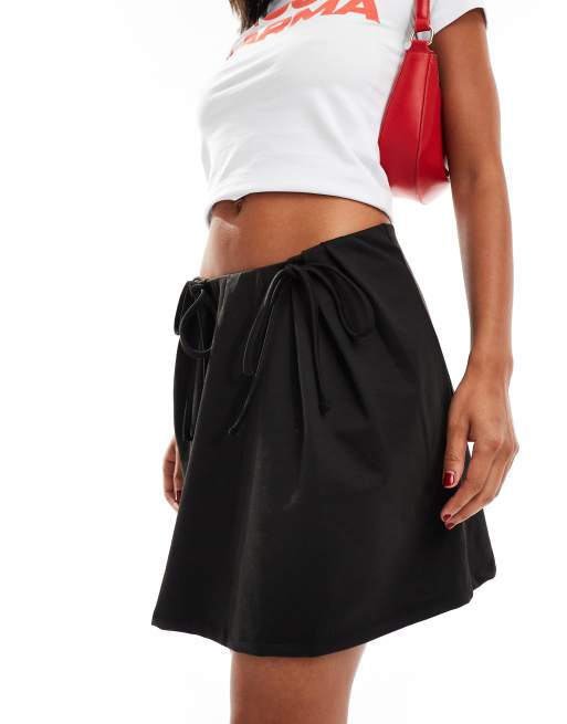Pieces - Mini rok met hoge taille en gestrikte zijkant in zwart