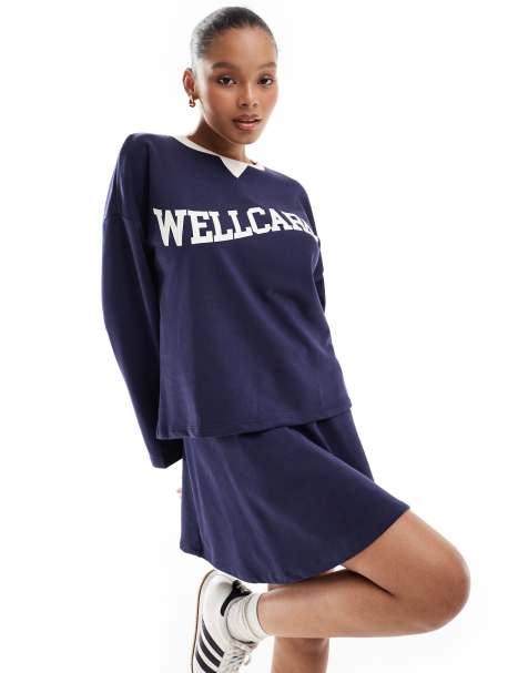 Pieces - Minigonna svasata in jersey blu navy con scritta "Wellcare" in coordinato - view 1