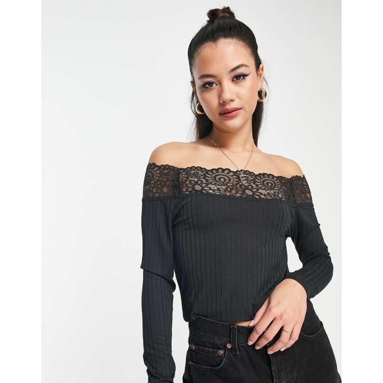 New Look open back long sleeved ribbed top in black