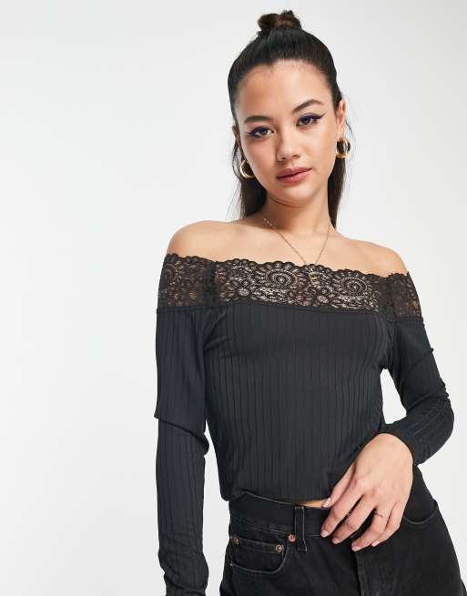 Off the shoulder shirt with black lace bra & jet black pants