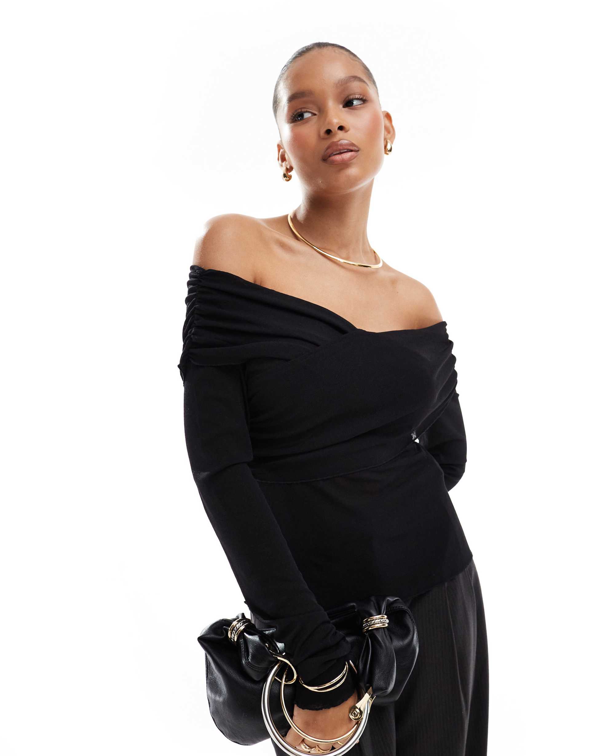 pieces off the shoulder wrap long sleeved top in black