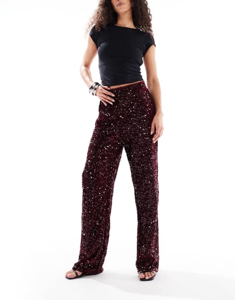Pieces – Pailletten-Hose aus Velours in Burgunderrot mit weitem Bein - view 1