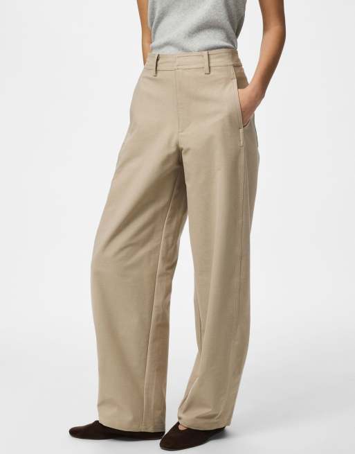 Pieces pantalones tipo trench, 1 de 7