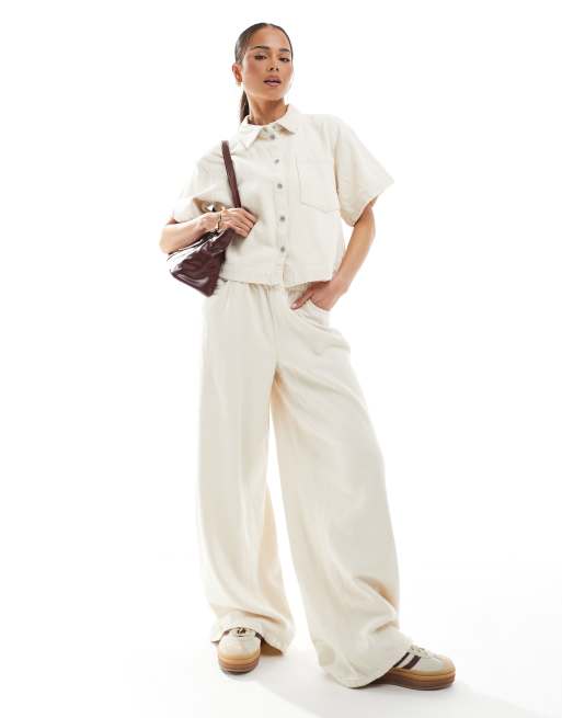 Pieces - Pantaloni a fondo ampio in twill testurizzato di cotone grezzo color crema in coordinato