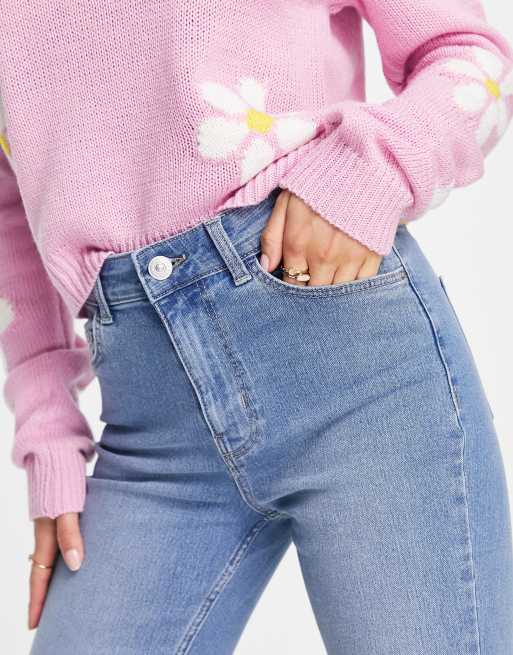 Pieces Petite Peggy flared jeans in pink