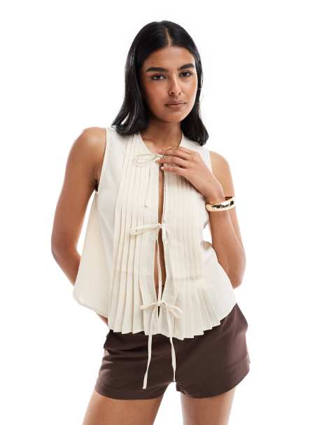 Pieces pleat detail tie front vest in cream - view 1