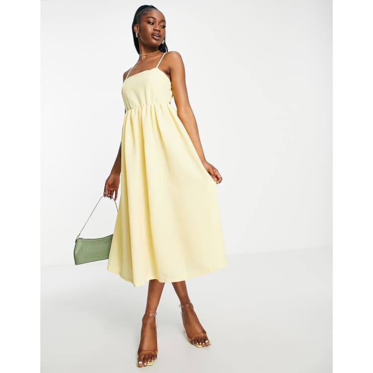 Pieces Premium textured open back midi dress in pale yellow ASOS