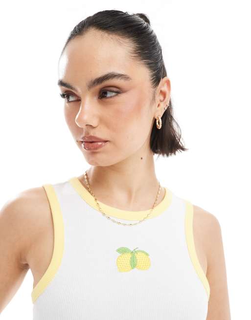 Pieces racer neck tank top with embroidered lemon graphic in white