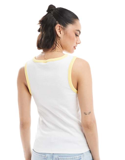 Pieces racer neck tank top with embroidered lemon graphic in white