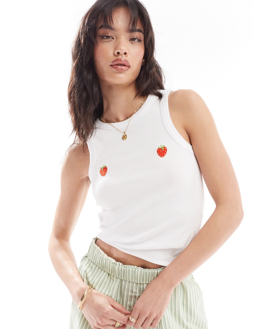 Pieces racer neck vest top with embroiderd strawberry placement in white