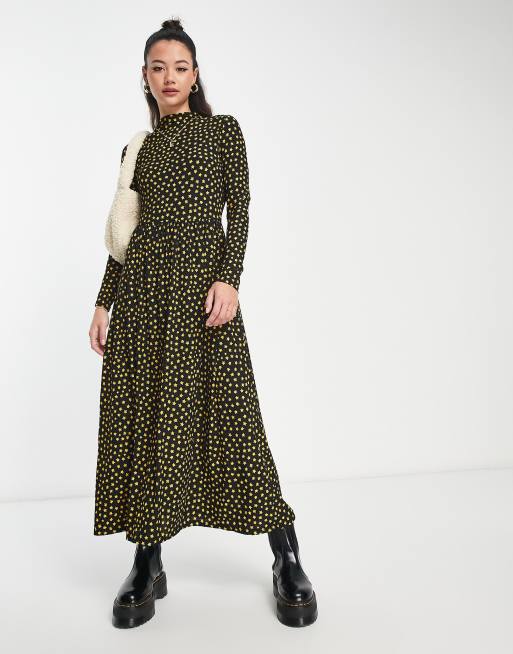 Robe noir pois online doré