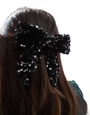 sequin bow hair clip in black