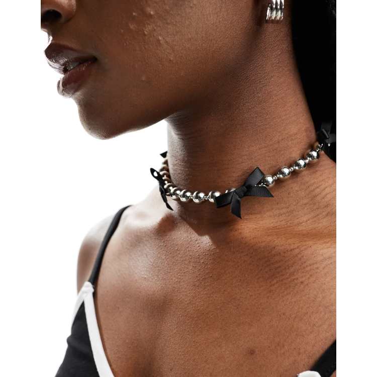 Pieces silver ball choker necklace with mini satin bow detail in black ASOS