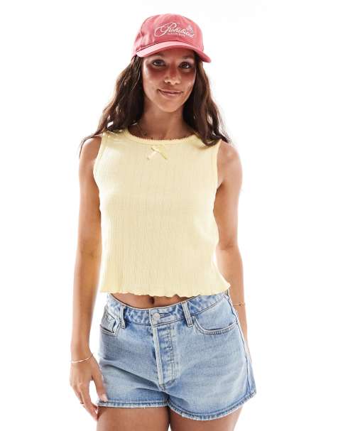 Pieces sleeveless cropped pointelle top with bow trim in pale banana - view 1