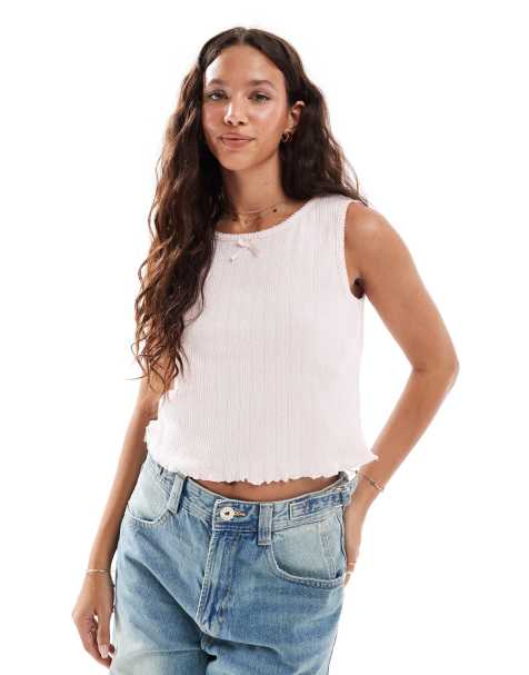 Pieces sleeveless cropped pointelle top with bow trim in pale pink - view 1