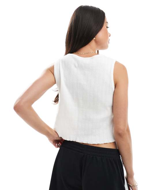 PIECES sleeveless cropped pointelle top with bow trim in white, 4 of 4
