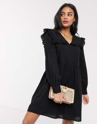 black dress with ruffle collar
