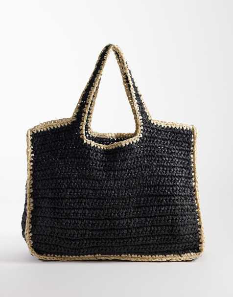 PIECES – Strandtasche aus gewebtem Stroh in Schwarz mit naturfarbenen Kanten - view 1