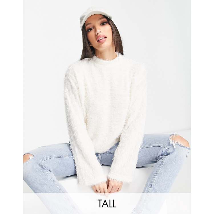 White fluffy shop roll neck jumper