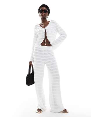 textured wide leg pants in white - part of a set