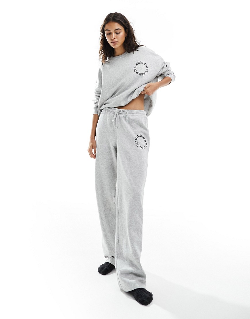 Pieces ’the casual club’ slogan wide leg joggers co-ord in grey