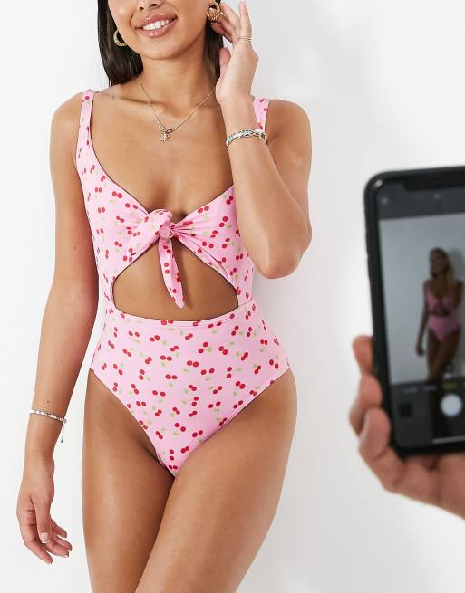 Pieces tie front cut out swimsuit in pink cherry print