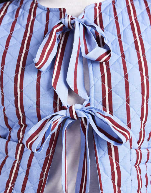 Pieces tie front quilted gilet in blue and burgundy stripe