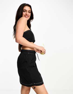 toggle mini cargo skirt in black with contrast stitching - part of a set