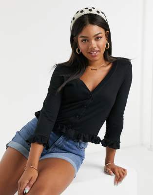 Pieces top with button through front and ruffle detail in black