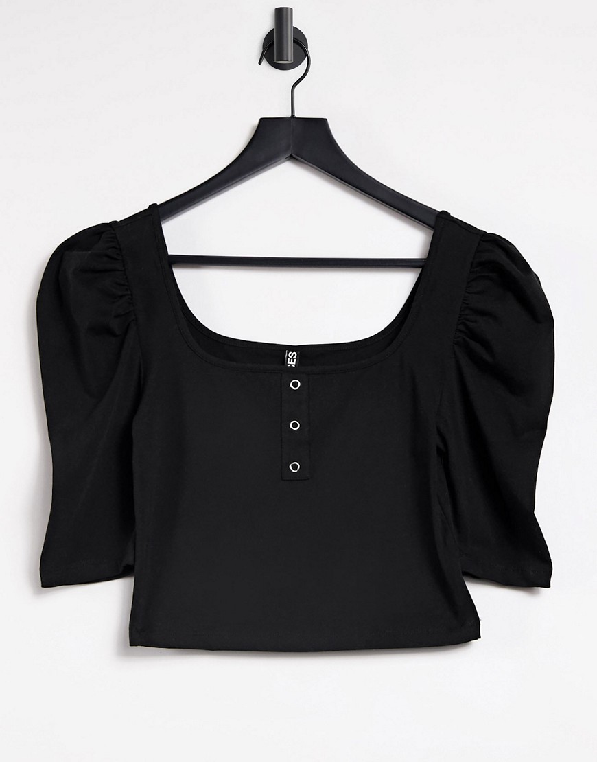 Pieces top with scoop neck and snaps detail in black