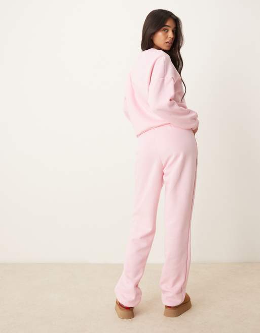 Pieces wellness 'sports running club' cuffed joggers co-ord in baby pink
