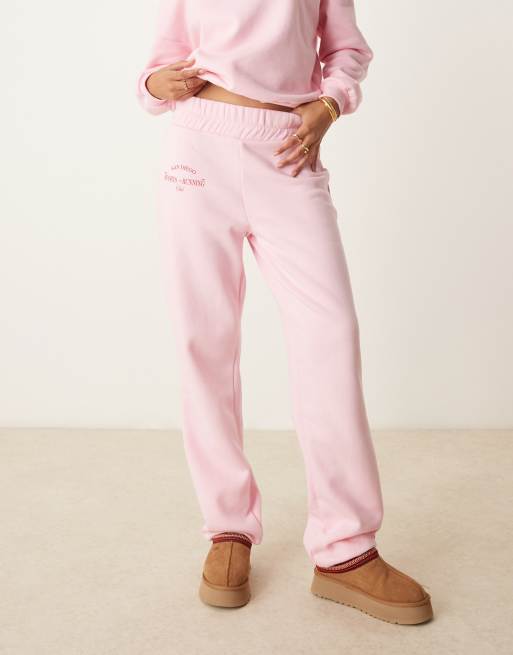 Pieces wellness sports running club cuffed trackies in baby pink part of a set ASOS