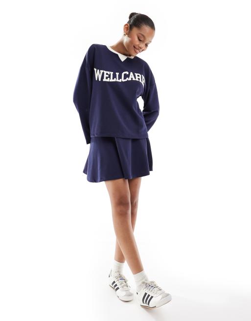 Pieces wellness 'Wellcare' a-line jersey mini skirt in navy blue (part of a set)