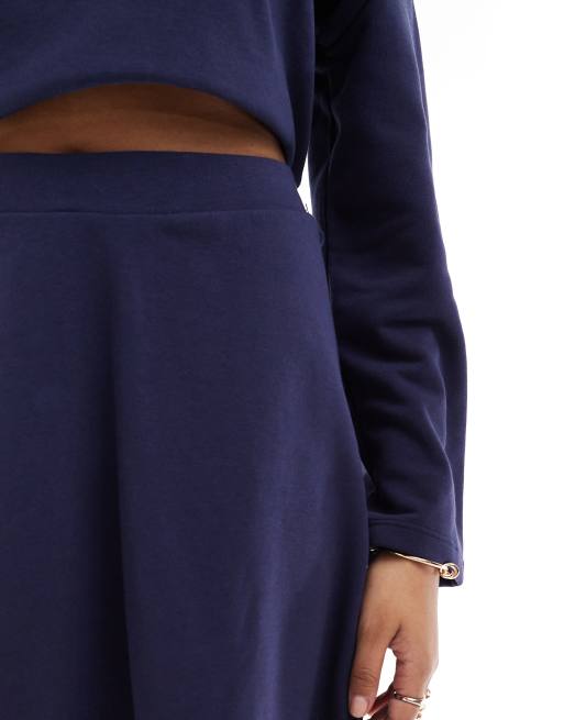 Pieces wellness 'Wellcare' a-line jersey mini skirt in navy blue (part of a set)