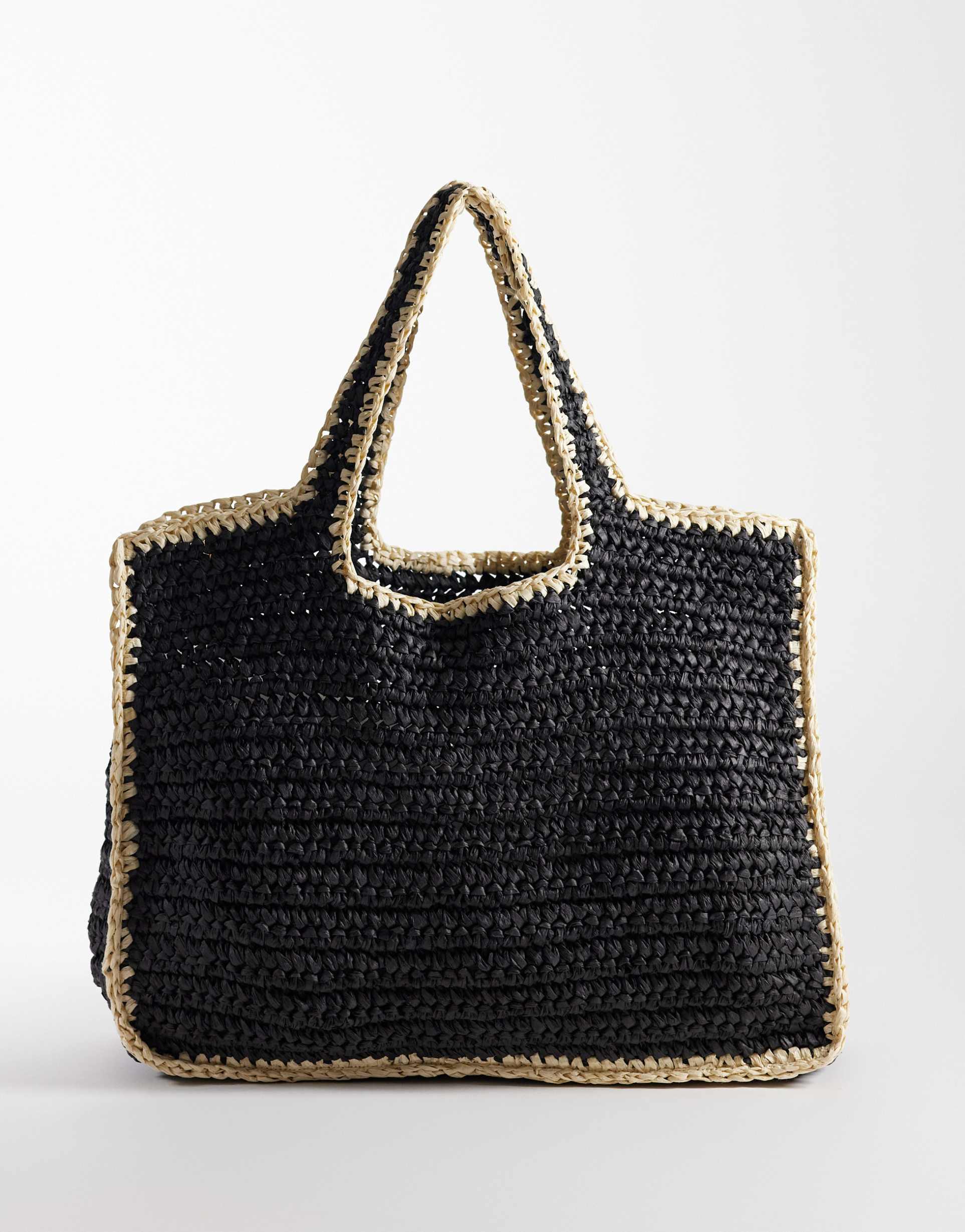 pieces woven straw beach bag in black with natural edges