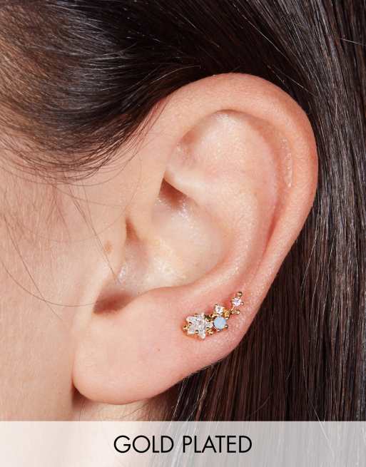 Piercing trepador pequeño con diseño de estrella azul y barra de 6 mm de titanio chapado en oro de 18 quilates de With Bling