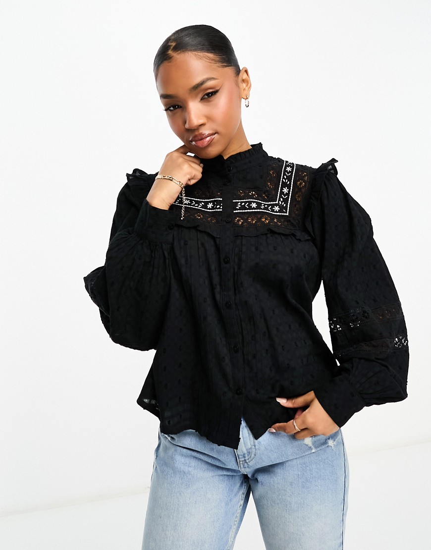 Pimkie lace insert ruffle trim high neck blouse in black