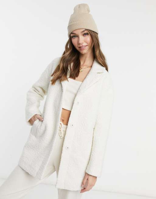 manteau duveteux femme blanc