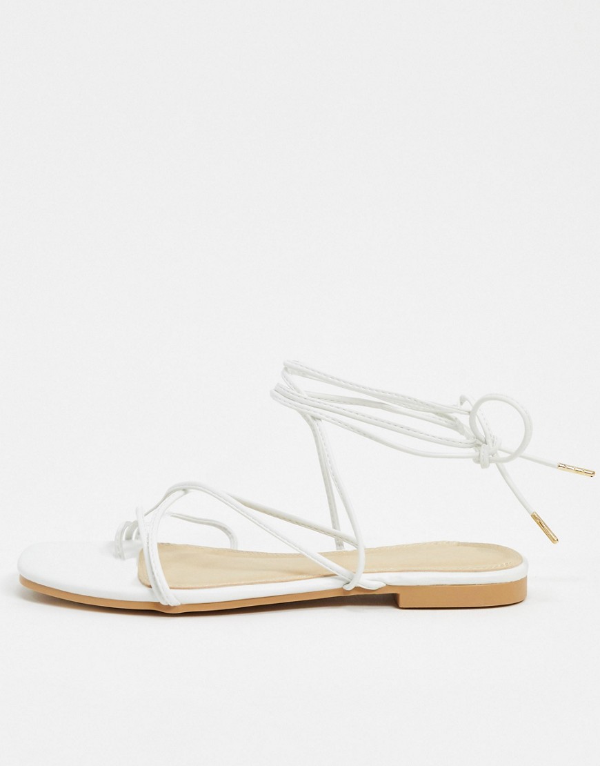Pimkie - Platte sandalen met wikkelbandjes in wit