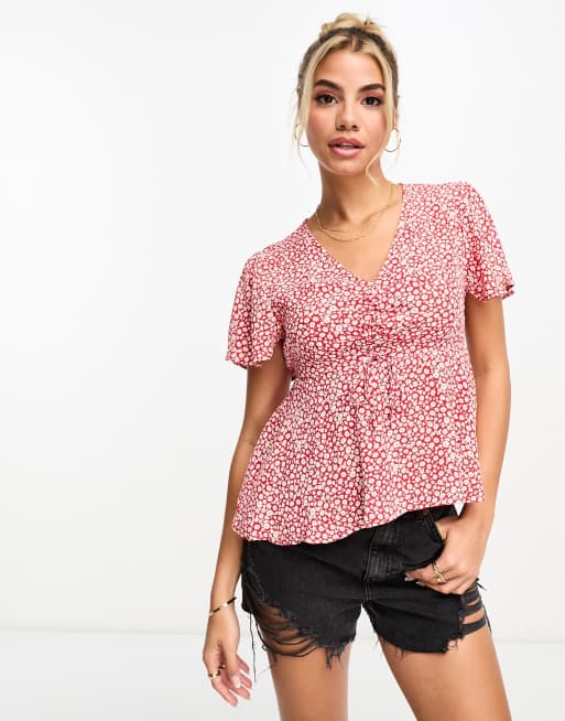 Pimkie - Rød bluse med gennemgående knapper og småblomstret print