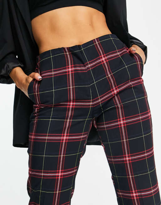 Red and store black check trousers