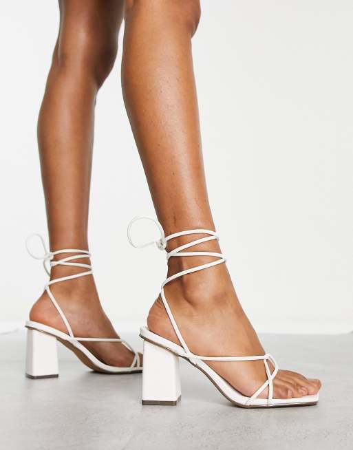 Pimkie strappy wrap around mid heel sandals in white ASOS