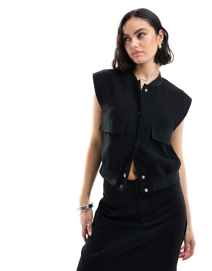 Pimkie tailored sleeveless pocket detail jacket in black