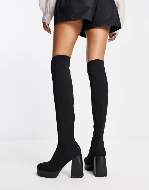 Flat heeled on sale thigh high boots