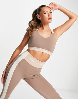 Pink Soda cross back light support sports bra in taupe