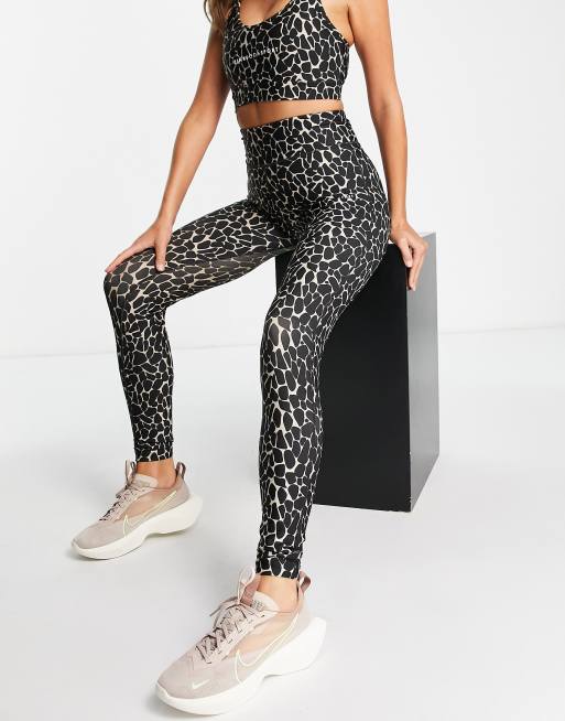 Pink Soda – Leggings in Olivgrün mit Animalprint