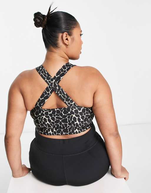 Pink Soda Plus light support sports bra in black animal print ASOS